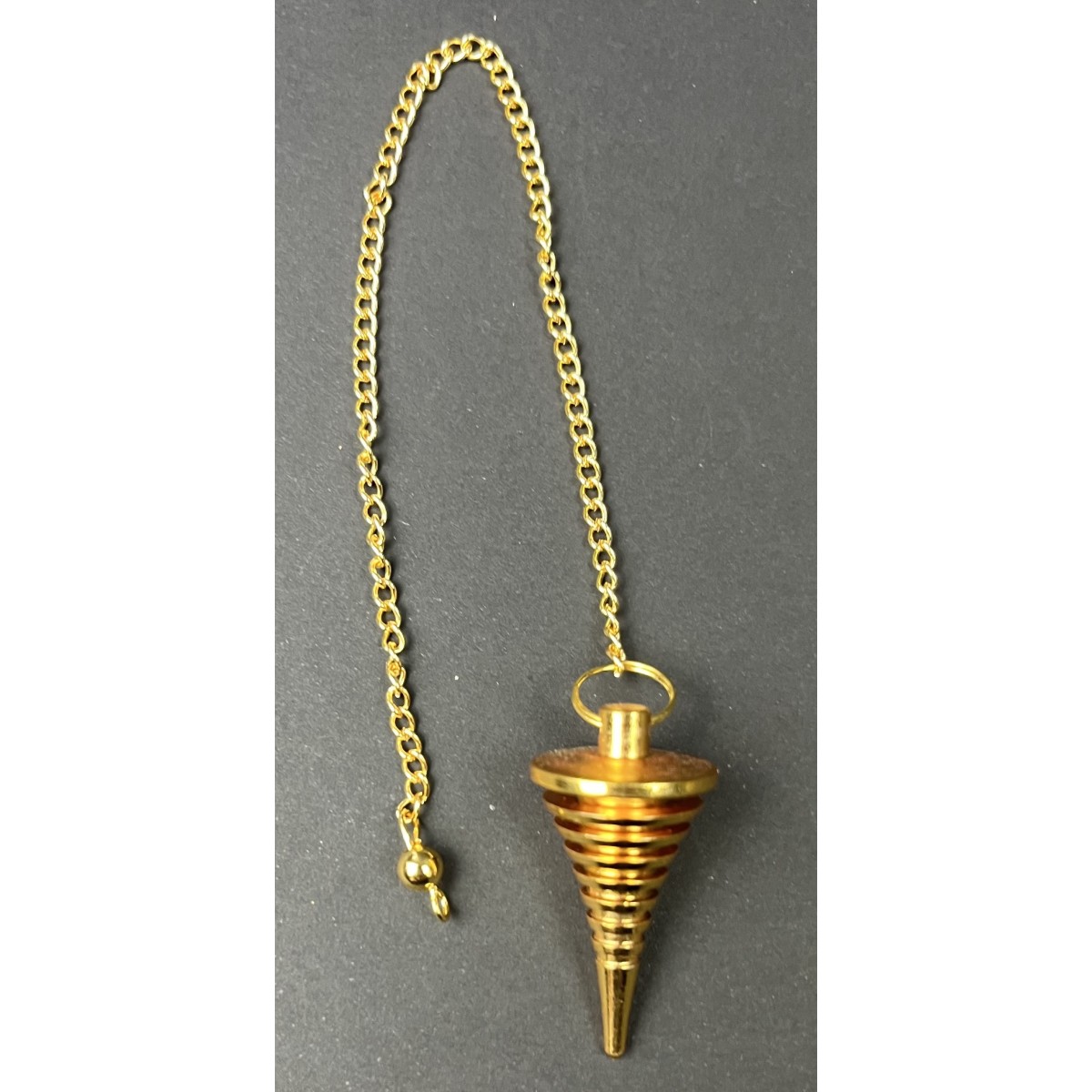 Pendule cannelé doré